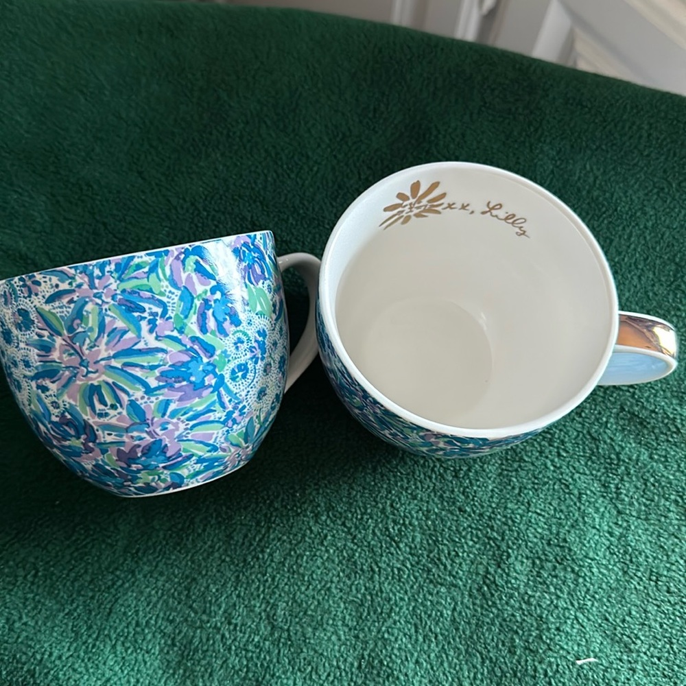 ADORABLE PAIR OF LILLY PULITZER MUGS. Blue/green mix w/gold tone handles. VGUC.